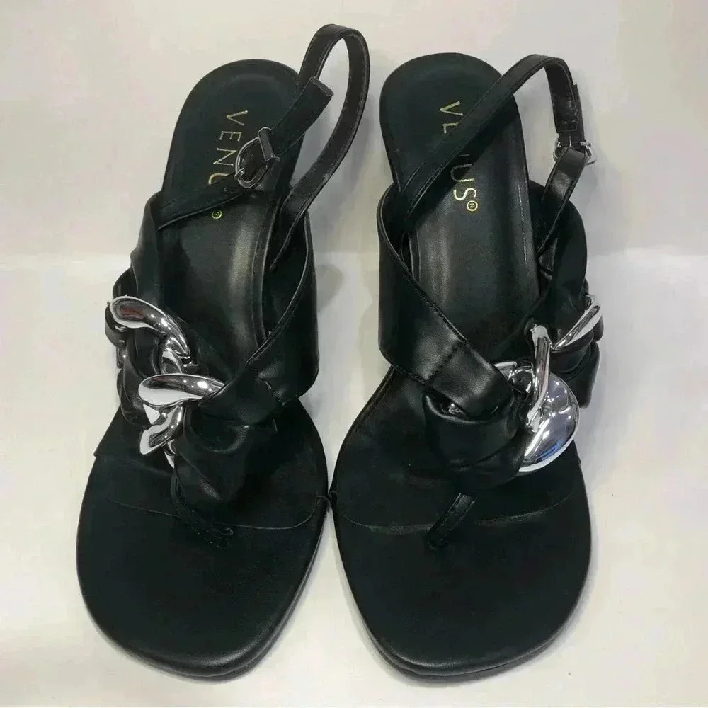 Black and silver heels size 7.5